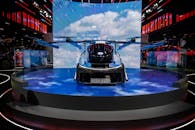 Flying car exhibit at automotive event in São Paulo showcasing innovation in transport technology.